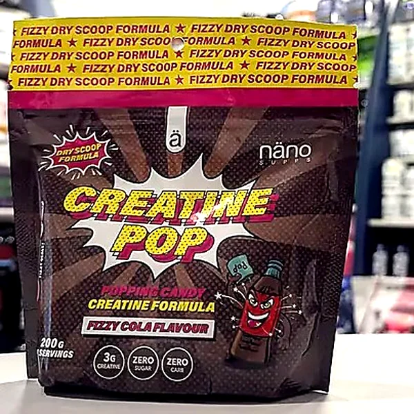 A pouch of Creatine Pop, fizzy cola flavour, on the shop counter